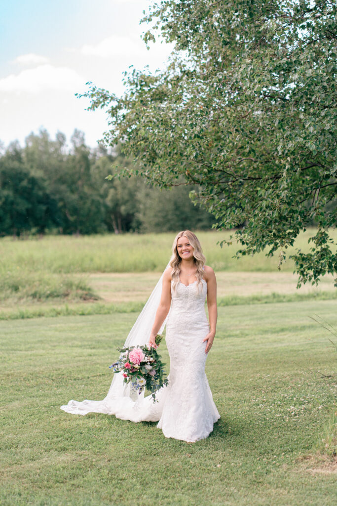 Pastel wedding inspiration with bride in lace gown at Mountain Field Farms, Palmer Alaska