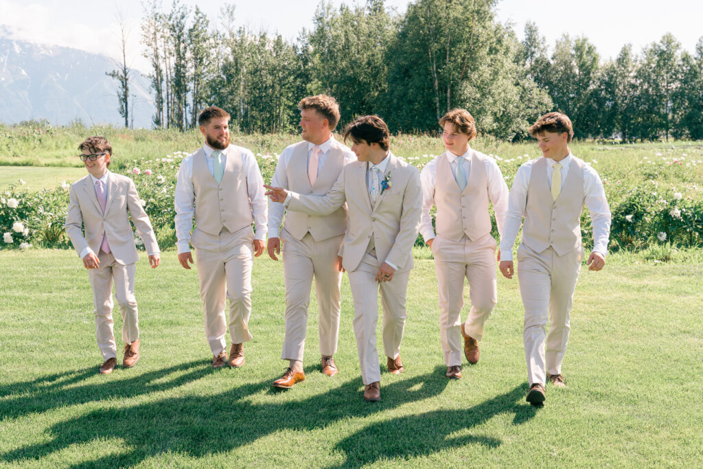 Pastel wedding inspiration groom in beige suit at Mountain Field Farms, Palmer Alaska
